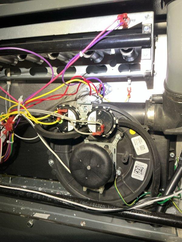 Completed scheduled preventative maintenance on residential HVAC cooling system as part of ongoing maintenance program. Performed comprehensive inspection of furnace blower motor assembly, verified proper electrical connections and wiring integrity, checked condensate drainage system and PVC vent piping for proper operation, and documented equipment condition through photographic records. All components found operating within normal parameters with no immediate service needs identified.