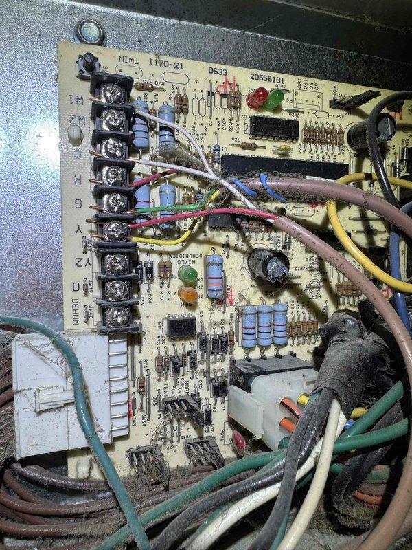 Completed comprehensive cooling system tune-up on residential HVAC unit. Performed thorough inspection of control board (NIMI 1170-21), verifying all terminal connections, capacitors, and electrical components for proper operation. Inspected compressor unit, refrigerant lines, and high-voltage wiring, confirming all safety labels present and system operating within normal parameters.