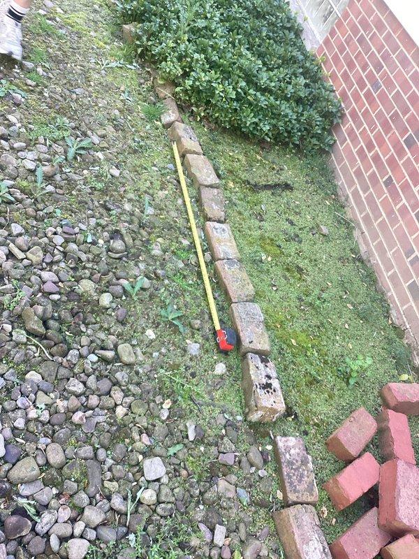 Conducted comprehensive site assessment for residential standby generator installation and additional electrical work. Performed detailed measurements of proposed generator pad location adjacent to existing structure, documenting clearance requirements from brick building and evaluating ground conditions including gravel substrate and drainage patterns. Assessed electrical service access points, existing utility pathways, and proper setback distances from structure in accordance with manufacturer specifications and local code requirements. Photographed site conditions including foundation areas, ground surfaces, and existing landscaping features to develop accurate material and labor estimates. Provided detailed quotation for generator installation package and supplementary electrical upgrades required for project completion.