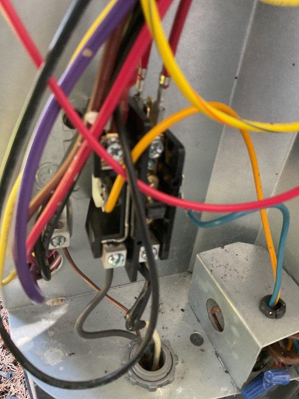 Completed scheduled cooling system maintenance as part of ongoing preventative service plan. Inspected and evaluated air filter, finding significant dust and debris accumulation on pleated media; filter showed grayish-brown discoloration indicating reduced airflow efficiency. Examined electrical control panel and contactor assembly, verifying proper wire connections and component operation. All electrical terminals secured and system components functioning within normal parameters.