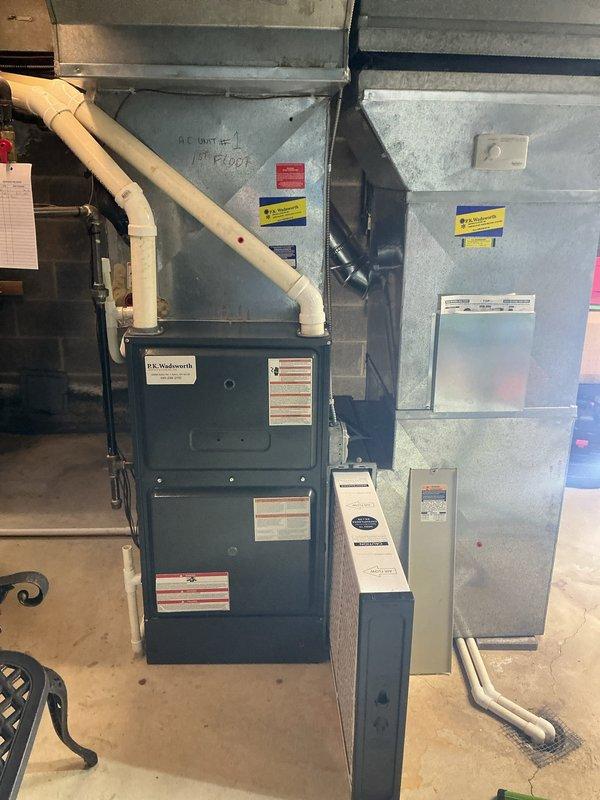 Completed comprehensive cooling maintenance on two HVAC systems: one P.K. Wadsworth furnace with air handler located in the basement utility area, and one outdoor condensing unit with Puron refrigerant positioned in the side yard. Performed standard preventive maintenance procedures including filter inspection, coil cleaning, refrigerant level verification, electrical connection testing, and operational system checks on both units to ensure optimal performance for the cooling season.