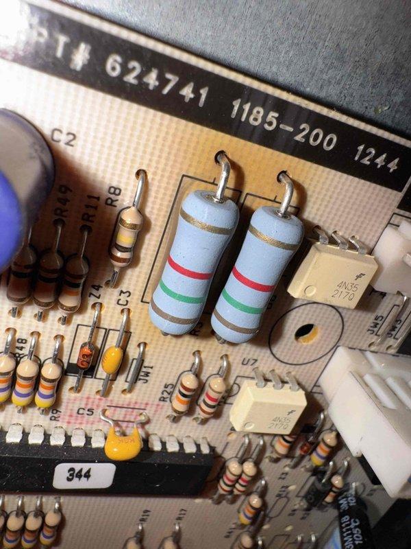 Responded to no heat call on Nordyne furnace system. Upon arrival, performed diagnostic inspection of unit and control board assembly. Inspected circuit board PT# 624741 1185-200 1244, examining all electronic components including resistors, capacitors, and integrated circuits for signs of failure or damage. Control board showed age-related discoloration but components appeared intact and properly mounted. Completed system diagnostics and restored heating operation to unit.