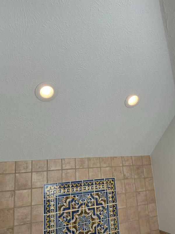 Responded to service call for troubleshooting non-functioning bathroom lighting. Upon arrival, inspected multiple ceiling-mounted light fixtures including flush-mount and recessed lighting installations. Diagnosed electrical issues affecting bathroom illumination, performed necessary repairs to restore proper operation of all affected fixtures. All lights tested and confirmed operational upon completion.