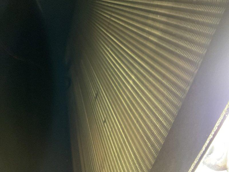 Completed scheduled cooling maintenance on UNICO high-velocity HVAC system. Performed comprehensive inspection of furnace unit and evaporator coil assembly, verified proper operation of all components, and confirmed coil fins were clean with no debris accumulation. System tested and operating within normal parameters.