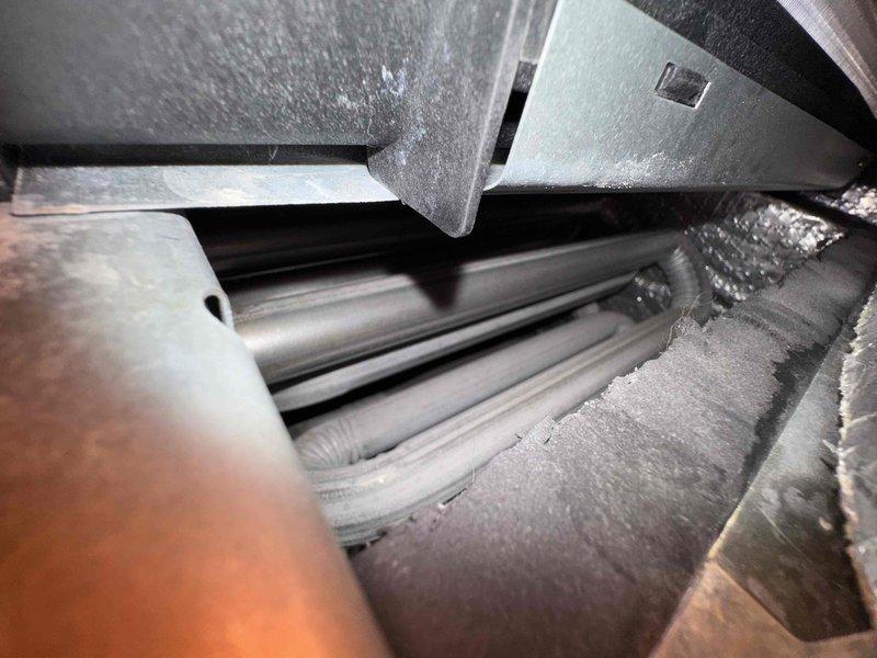 Performed comprehensive cooling maintenance on HVAC system. Upon inspection, discovered evaporator coil heavily contaminated with dust and debris accumulation throughout the fin assembly, restricting airflow and reducing system efficiency. Thoroughly cleaned evaporator coil to restore proper heat transfer and airflow capacity. Conducted diagnostic testing of refrigerant system using calibration-grade instruments, checking pressures and temperatures at suction line to verify proper system operation. Inspected all accessible refrigerant lines, connections, and components for leaks or deterioration. System returned to normal operating parameters following maintenance procedures.