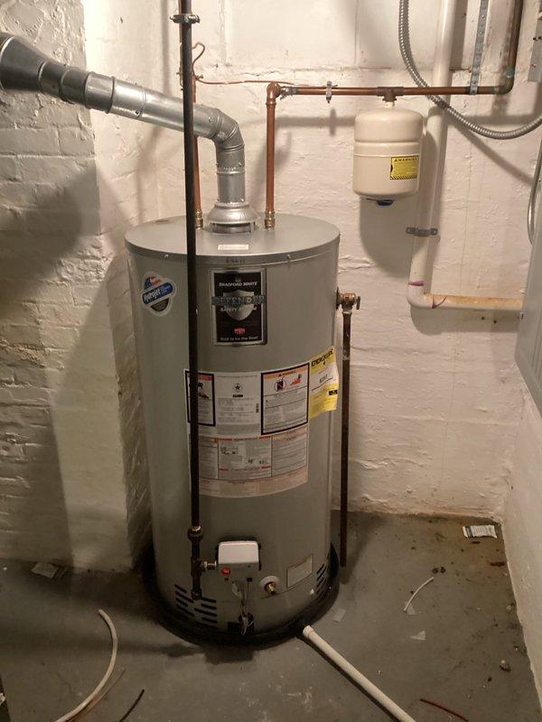 Performed routine maintenance flush on tanked water heater to remove sediment buildup and ensure optimal performance. Customer inquired about follow-up regarding a replacement part for upstairs shower handheld shower head that was to be ordered during previous visit; will coordinate with office to address outstanding order and schedule installation.