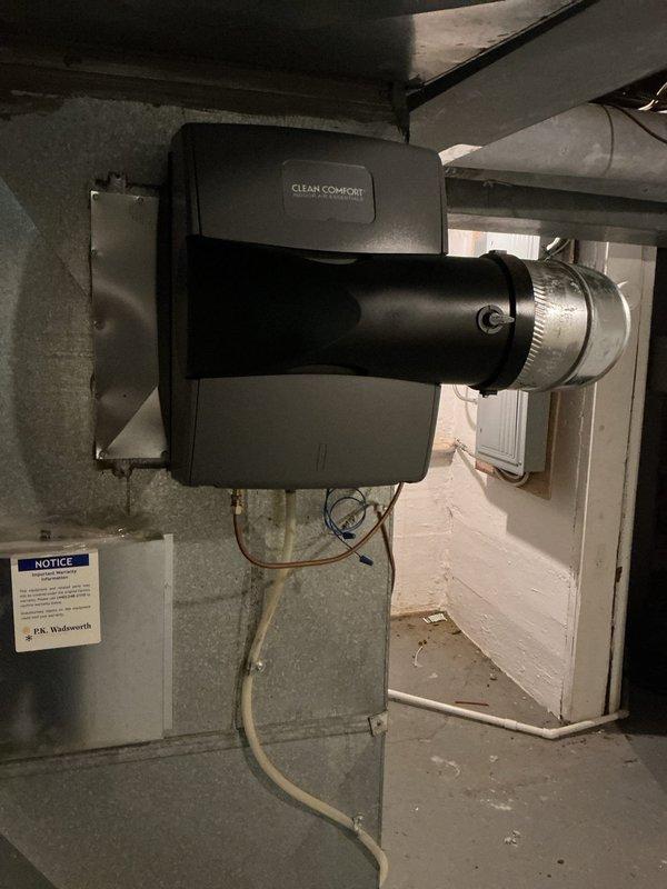 Completed routine cooling system maintenance inspection on residential HVAC unit. Performed comprehensive system evaluation including visual inspection of humidifier unit, ductwork connections, and associated mechanical components. All equipment found operating within normal parameters with no service issues identified or repairs required.