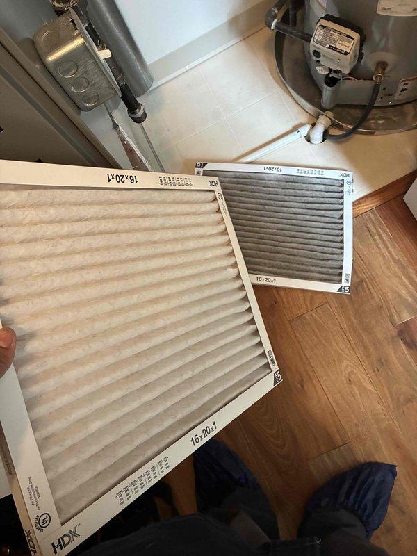 Completed mid-morning cooling system tune-up and maintenance inspection. Removed significant accumulation of leaves, mulch, and organic debris from outdoor condenser unit that had built up around electrical connections and equipment housing. Replaced dirty air filter with clean filter to restore proper airflow and system efficiency. Verified electrical connections and wiring integrity at outdoor unit following debris removal.