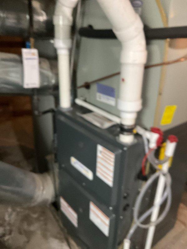 Completed comprehensive heating and cooling tune-up on residential HVAC system. Performed thorough inspection of furnace burner assembly, gas valve, pressure switches, and ignition components, verified all electrical connections and control wiring, and inspected air conditioning unit. Documented system condition with photos showing proper operation of all components, confirmed safety controls functioning correctly, and system operating within manufacturer specifications.