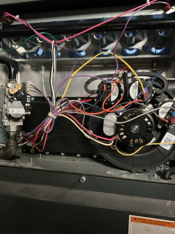 Completed comprehensive heating and cooling tune-up on residential HVAC system. Performed thorough inspection of furnace burner assembly, gas valve, pressure switches, and ignition components, verified all electrical connections and control wiring, and inspected air conditioning unit. Documented system condition with photos showing proper operation of all components, confirmed safety controls functioning correctly, and system operating within manufacturer specifications.