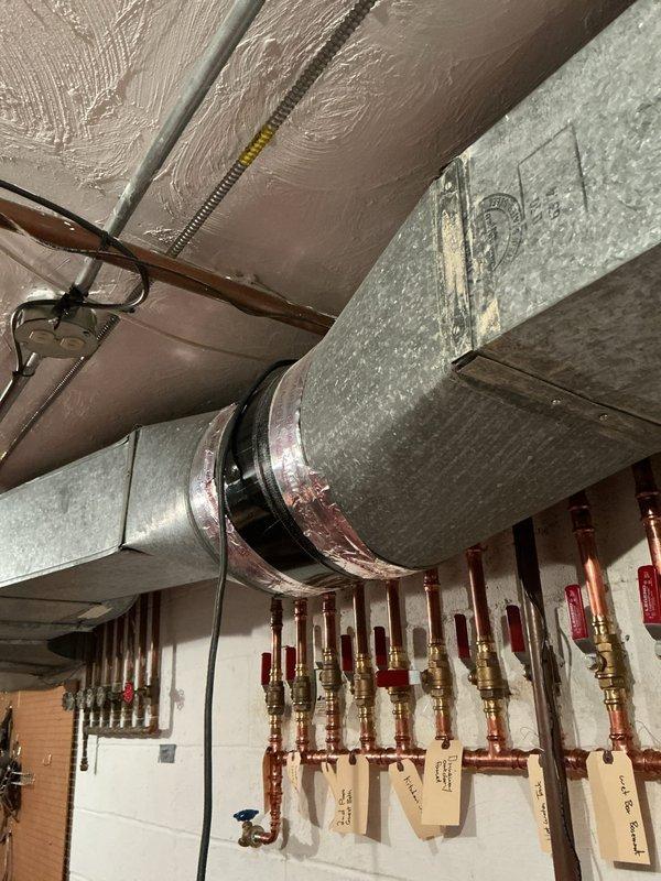 Completed comprehensive heating and cooling maintenance on residential HVAC system following customer's extended absence from the country. Performed full inspection and maintenance procedures on furnace unit, ductwork, copper piping manifold system with multiple zone valves, and associated components to ensure proper operation of both heating and cooling systems.