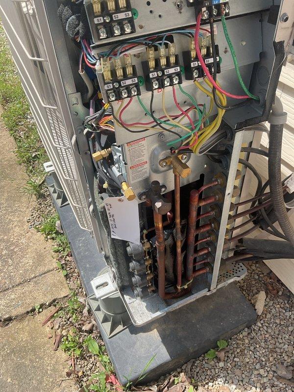 # HVAC Maintenance - Cooling Systems

Completed comprehensive preventive maintenance on two outdoor HVAC units, including inspection of electrical components, terminal connections, contactors, and refrigerant lines. Both systems were accessed, internal components photographed for documentation, and units verified to be in proper working condition with all wiring connections secure and copper refrigerant lines intact.