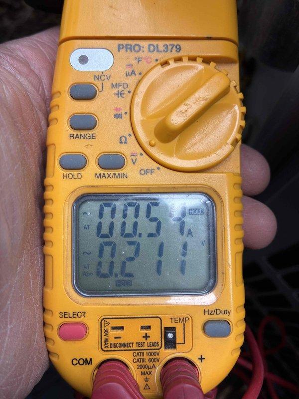 Completed routine cooling system maintenance and hot water tank service. Performed electrical diagnostics using digital multimeter to verify system performance and inspected evaporator coil, which showed moderate dust and debris accumulation on aluminum fins but maintained proper structural integrity with no bent fins or refrigerant line damage. All components tested within normal operating parameters.