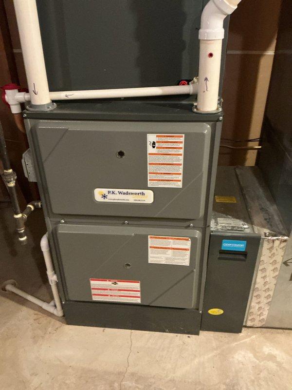 Completed comprehensive HVAC tune-up on residential furnace system. Performed standard maintenance procedures including system inspection, filter evaluation, and temperature diagnostics. Supply air temperature measured at 52.1°F with humidity reading of 39.4%, indicating proper system operation during cooling mode assessment.
