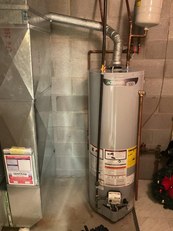 Performed comprehensive cooling system tune-up on residential HVAC unit located in basement utility room. Completed standard maintenance procedures including inspection of furnace unit, refrigerant lines, ductwork connections, and overall system operation to ensure optimal performance for the cooling season.