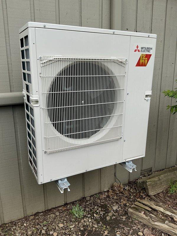 Completed comprehensive cooling maintenance on two-system HVAC setup consisting of a York central air conditioning unit and a Mitsubishi Electric mini-split system. Performed standard preventive maintenance procedures on both systems including inspection of condenser units, verification of proper airflow through coils and grilles, assessment of refrigerant lines, and evaluation of overall system operation. Both outdoor units were found in good working condition with no immediate repairs required; protective grilles and housing components were intact and properly secured.