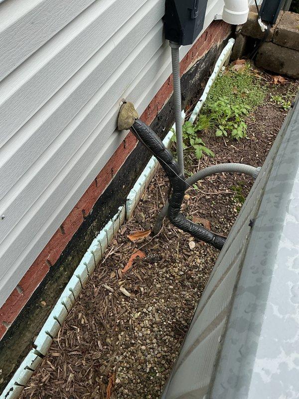 Completed first-year cooling maintenance on residential HVAC system. Performed comprehensive inspection of outdoor condensing unit and indoor air handler components, verified refrigerant levels, checked electrical connections at control panel, and inspected ductwork installation in attic space. All system components found operating within normal parameters with no deficiencies noted.