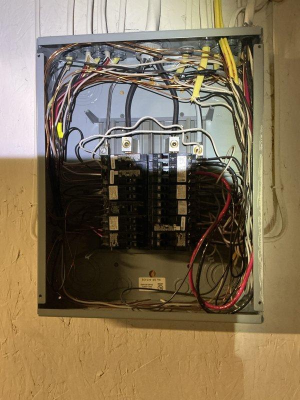 Completed comprehensive electrical panel inspection at residential property. Thoroughly examined two main distribution panels, documenting circuit breaker configurations, wire routing, bus bar connections, and overall system integrity. Verified proper wire color coding, conductor sizing, and termination methods throughout both panels. Photographed all components including main breakers, branch circuit breakers, neutral and ground bus connections, and incoming service conductors for record-keeping purposes. All findings documented for client review and future reference.