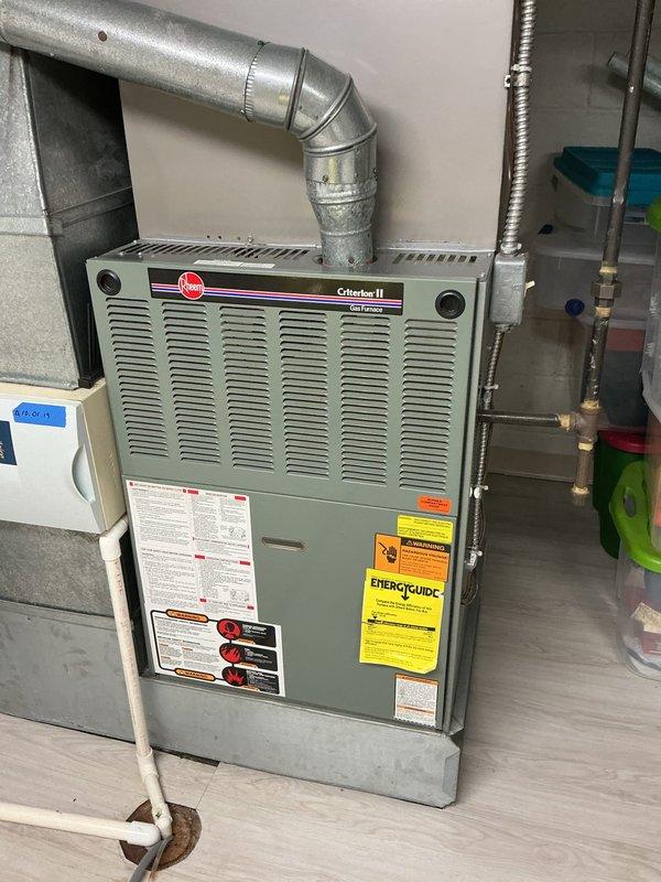 Completed cooling tune-up on residential HVAC system including outdoor condenser unit and indoor Rheem Criterion II furnace. Performed standard maintenance inspection, checked refrigerant levels, cleaned condenser coils, verified electrical connections, and tested system operation to ensure optimal performance for the cooling season.