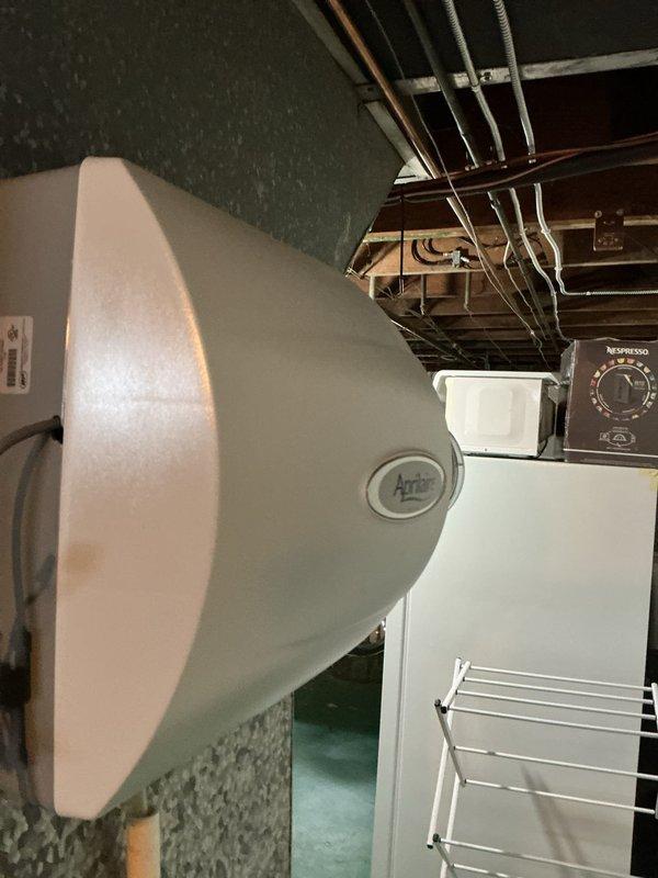 Completed scheduled preventive maintenance on residential cooling system as part of ongoing maintenance agreement. Performed comprehensive inspection of HVAC equipment located in basement utility area, verified system operation, and recorded supply air temperature of 53°F with 38% relative humidity at register, indicating proper cooling performance and equipment functionality.