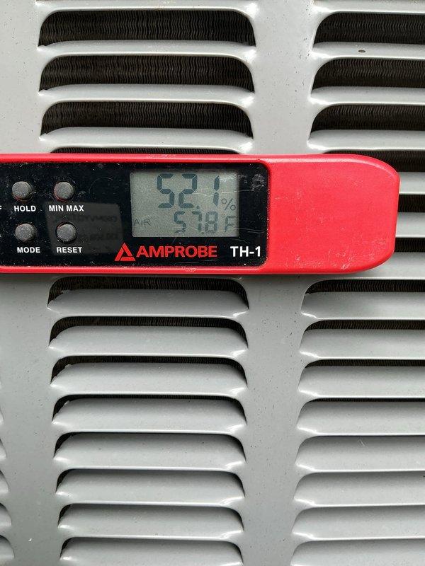 Completed scheduled preventive maintenance on residential cooling system as part of ongoing maintenance agreement. Performed comprehensive inspection of HVAC equipment located in basement utility area, verified system operation, and recorded supply air temperature of 53°F with 38% relative humidity at register, indicating proper cooling performance and equipment functionality.