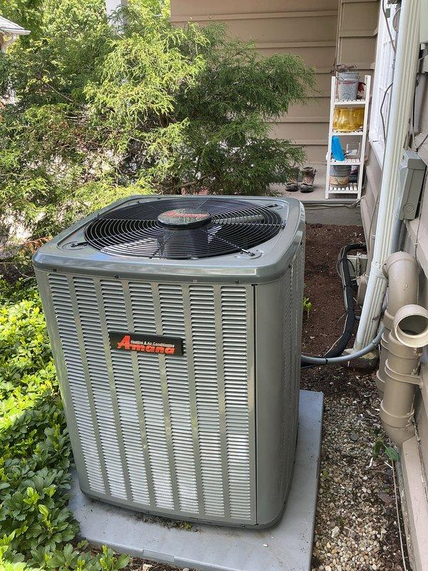 Completed annual preventative maintenance service on residential split-system air conditioning unit as part of scheduled maintenance plan. Performed comprehensive inspection of outdoor condensing unit, which was found in good operating condition with no visible signs of damage, corrosion, or deterioration. Unit is properly positioned on concrete pad with adequate clearance and surrounded by well-maintained landscaping. Verified all manufacturer labels and safety decals are present and legible. Inspected fan assembly, cabinet louvers, and external components for proper condition. Confirmed refrigerant line set and associated piping connections are secure with no visible signs of leakage or damage. System demonstrates normal operational characteristics consistent with routine maintenance visit.
