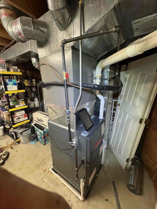 Responded to callback regarding two leaks on recently installed furnace system. Upon inspection, identified issues with condensate drainage piping connections. Verified PVC condensate drain line installation, checked all joints and fittings for proper sealing, and inspected connections at furnace discharge point. Examined ductwork connections to ensure proper sealing at furnace plenum. Tightened and resealed affected pipe joints, verified proper slope on condensate lines for drainage, and tested system operation to confirm leaks were resolved. All connections now secure with no active leaks detected during test cycle.
