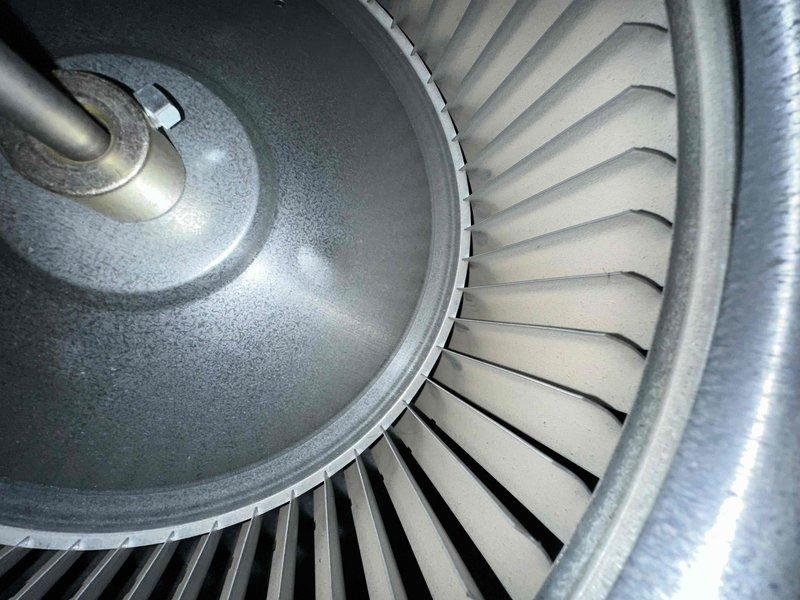 Completed routine HVAC cooling system maintenance including inspection of blower wheel assembly and electrical connections. The blower wheel and fan blades showed normal operational wear with minor dust accumulation, and all electrical wiring at the control module was verified secure with proper connections intact.
