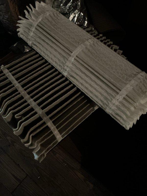 Performed comprehensive cooling maintenance on attic-mounted air handler system. Inspected evaporator coil assembly, noting dust accumulation on finned surfaces but confirmed structural integrity remains intact. Verified air handler unit installation, ductwork connections, and flexible duct insulation throughout attic space. All system components operational and properly secured within confined attic environment.