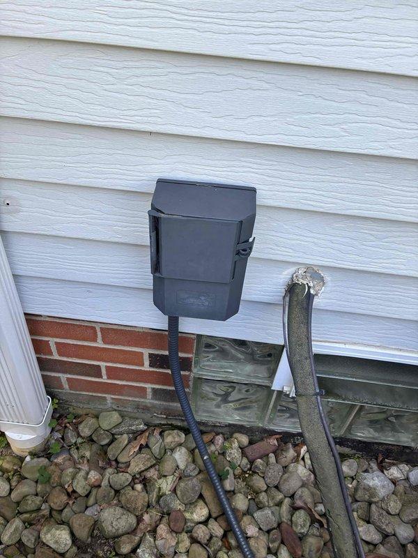 Completed comprehensive cooling system maintenance on residential HVAC unit. Inspected evaporator coil through air return grille, confirming proper fin condition and airflow capacity, and verified exterior condensing unit electrical disconnect and refrigerant line connections at building exterior. All components operating within normal parameters with no deficiencies noted.
