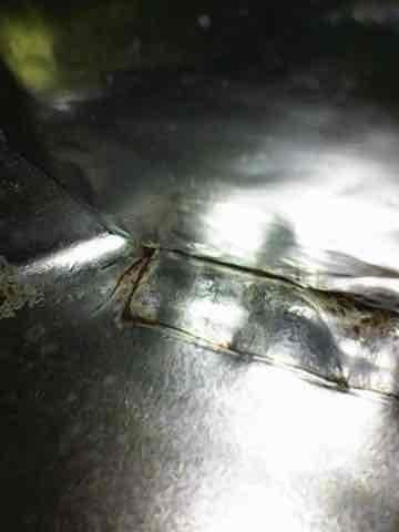 Responded to no heat call for second opinion on 10+ year old furnace system that previous contractor was unable to repair. Performed comprehensive diagnostic inspection of heating system and ductwork. Documented existing conditions including moisture accumulation on ductwork and connection points in mechanical space. Inspected duct joints, seams, and mounting hardware for proper installation and structural integrity. Provided customer with diagnostic findings and discussed repair versus replacement options given system age and current non-operational status.