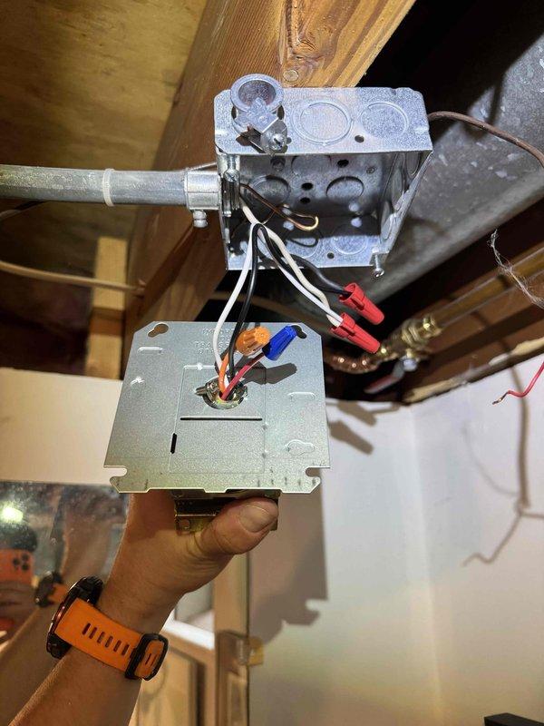 Responded to no-heat call following recent tankless water heater installation with electrical work. Performed diagnostic testing on HVAC transformer and electrical connections in attic space using voltage tester. Verified proper wiring connections, tested transformer output, and inspected junction box connections to restore system operation.
