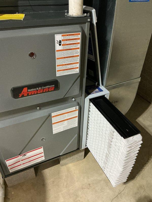 Completed scheduled cooling system maintenance on Amana HVAC unit. Inspected indoor furnace components, verified air filter condition, and examined outdoor condensing unit including electrical connections, capacitor, contactor, and control board. All components found in proper working order with organized wiring and secure connections.