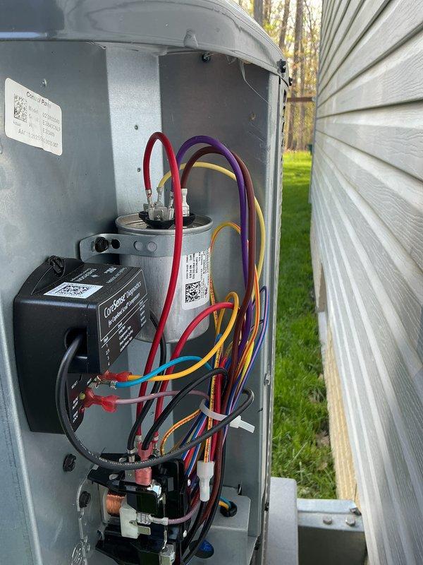 Completed scheduled cooling system maintenance on Amana HVAC unit. Inspected indoor furnace components, verified air filter condition, and examined outdoor condensing unit including electrical connections, capacitor, contactor, and control board. All components found in proper working order with organized wiring and secure connections.