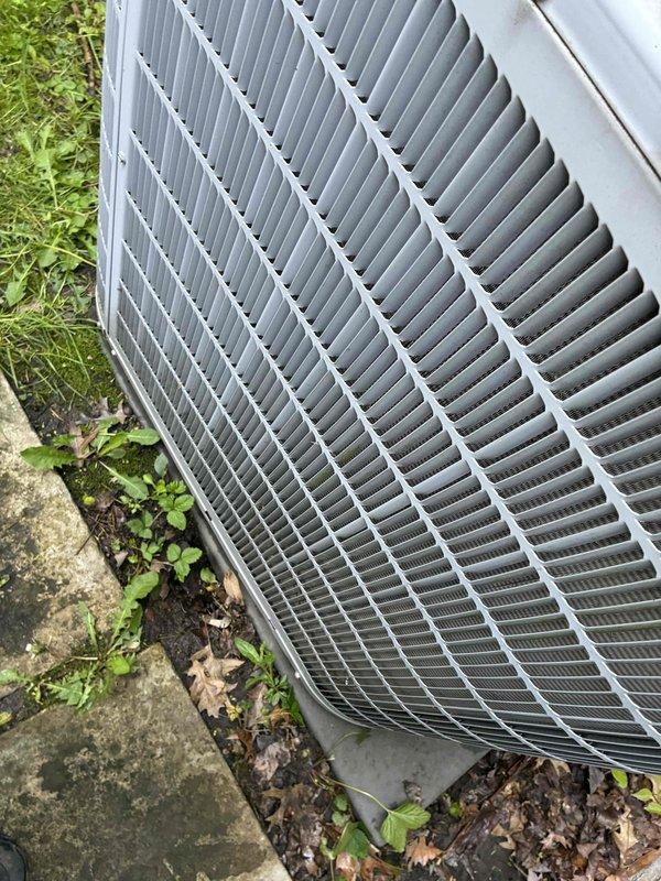 Completed cooling tune-up on outdoor condensing unit. Inspected electrical connections at capacitor terminals, noting age-related corrosion and oxidation on terminal points and wiring. Verified all wire connections secure, tested capacitor functionality, and confirmed proper operation of condenser fan assembly. Unit operating within normal parameters upon completion of maintenance inspection.