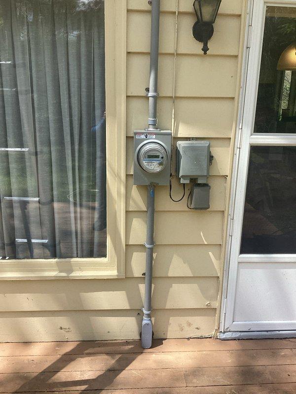 Replaced 100-amp exterior electrical panel and meter assembly in full compliance with current NEC code requirements. Installation included new circuit breaker panel with properly organized wire routing, updated metering equipment, weatherproof exterior enclosure, and code-compliant conduit connections.