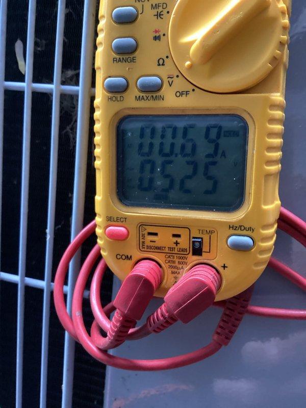 Completed comprehensive HVAC cooling and heating maintenance tune-up on residential system. Performed electrical diagnostics using digital multimeter to measure capacitance readings on outdoor condensing unit, verifying proper compressor and fan motor capacitor values for optimal system performance. All components tested within manufacturer specifications and system operating efficiently.