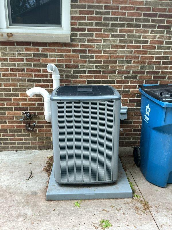# HVAC Cooling Maintenance Summary

Completed scheduled preventive maintenance on residential split-system air conditioning unit. Performed comprehensive inspection of outdoor condenser unit, verifying proper operation of compressor, fan motor, and electrical components. Checked refrigerant levels and system pressures within manufacturer specifications. Cleaned condenser coils and cleared debris from unit perimeter to ensure optimal airflow and heat exchange efficiency.

Inspected condensate drainage system including PVC drain lines for proper flow and verified no blockages present. Examined electrical connections, contactor operation, and capacitor functionality. All components operating within normal parameters. System cooling effectively with no immediate service needs identified.