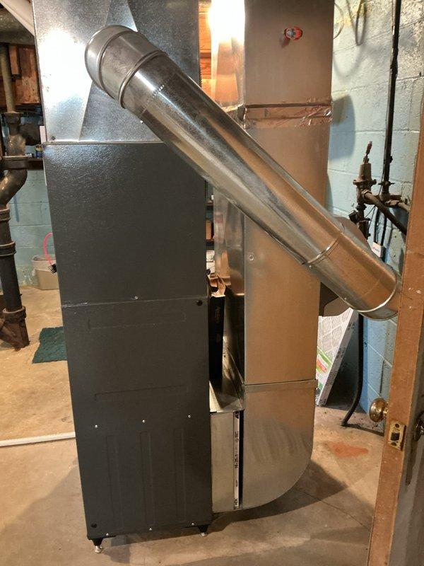 Completed preventative maintenance on residential Goodman air conditioning system. Inspected outdoor condensing unit including compressor, condenser coil, fan motor, and electrical connections. Verified proper operation of indoor air handler and ductwork connections in basement mechanical room. Checked refrigerant lines, electrical disconnect, and all associated components. System operating within normal parameters with no deficiencies noted.