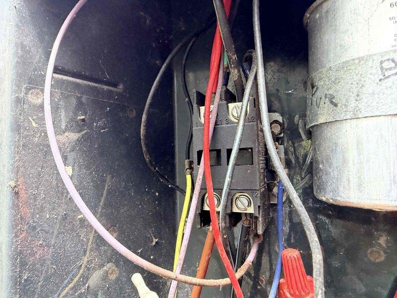 Completed comprehensive cooling system tune-up on outdoor condensing unit. Performed standard maintenance protocol including inspection of electrical connections, contactor assembly, and capacitor, all of which showed signs of age and environmental exposure but remained operational. Cleaned accumulated debris from unit enclosure, verified refrigerant line connections at service port, and confirmed system components were functioning within normal parameters.