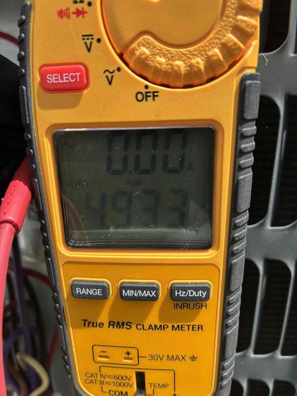 Performed routine cooling system maintenance and hot water tank inspection. Verified electrical parameters using clamp meter, confirming proper voltage and amperage readings at the unit. Inspected and tested fuse assembly, verifying both fuses were intact and functioning correctly with no signs of overheating or degradation.