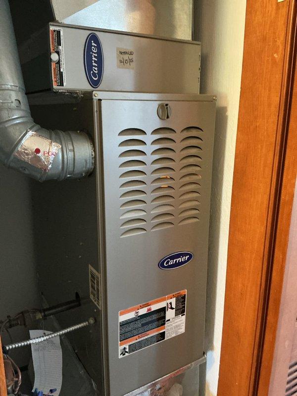 Completed preventive maintenance on two residential cooling systems. First unit serviced was a Carrier HVAC system located in utility closet accessed through back door. Second unit serviced was an Amana furnace system with associated air handler in basement mechanical room. Both systems were inspected, filters checked, and routine cooling season maintenance procedures performed according to manufacturer specifications and ongoing service agreement requirements.