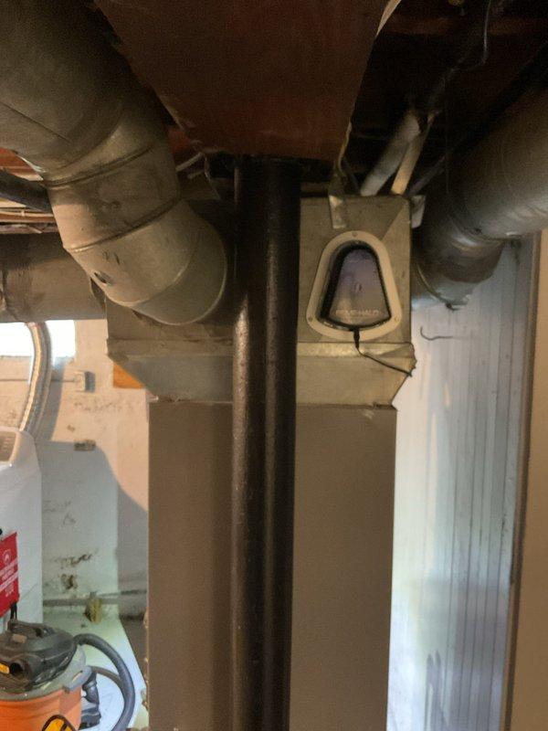 Completed routine HVAC cooling system maintenance including inspection of basement ductwork infrastructure and air filtration system. Replaced 16x25x5 pleated air filters in the metal housing unit to ensure optimal airflow and system efficiency for the upcoming cooling season.