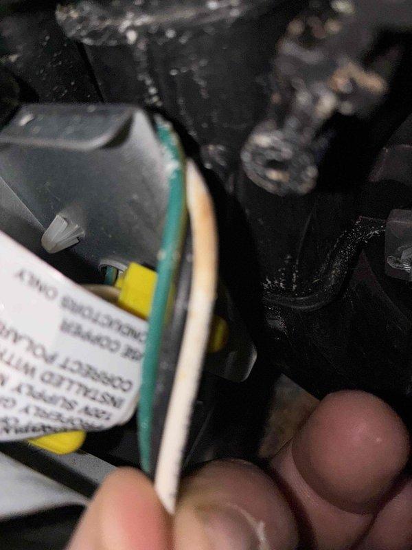 Completed routine HVAC cooling system maintenance including inspection of refrigerant line insulation at wall penetrations and verification of equipment labeling and wiring connections. System components were found in operational condition with minor insulation wear noted on copper refrigerant lines.