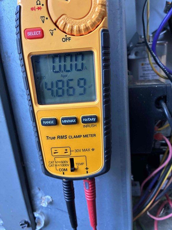 # HVAC Cooling Maintenance Summary

Completed scheduled preventive maintenance on residential cooling system. System operational with normal electrical readings observed during diagnostic testing.

# Detailed Work Performed

Conducted comprehensive cooling season maintenance inspection on air handler unit. Upon accessing the equipment, discovered significant accumulation of sediment, debris, and biological growth in the condensate drain pan, indicating extended operational period without servicing.

Performed electrical diagnostics using calibrated True RMS clamp meter to verify system performance parameters. Measured amperage draw and voltage readings at multiple points to ensure proper electrical operation. All electrical measurements fell within manufacturer specifications, confirming equipment is operating efficiently under current load conditions.

Inspected condensate management system including drain pan, condensate pump, and associated drainage components. The drain pan exhibit