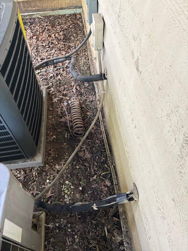 Completed full HVAC system replacement in basement mechanical room, including new heating and cooling equipment with associated ductwork, gas line connections with proper shut-off valve, and PVC venting. Installed outdoor condensing unit with refrigerant line set and electrical conduit routed through landscaping area to exterior wall penetration, ensuring all components meet current code requirements and manufacturer specifications.