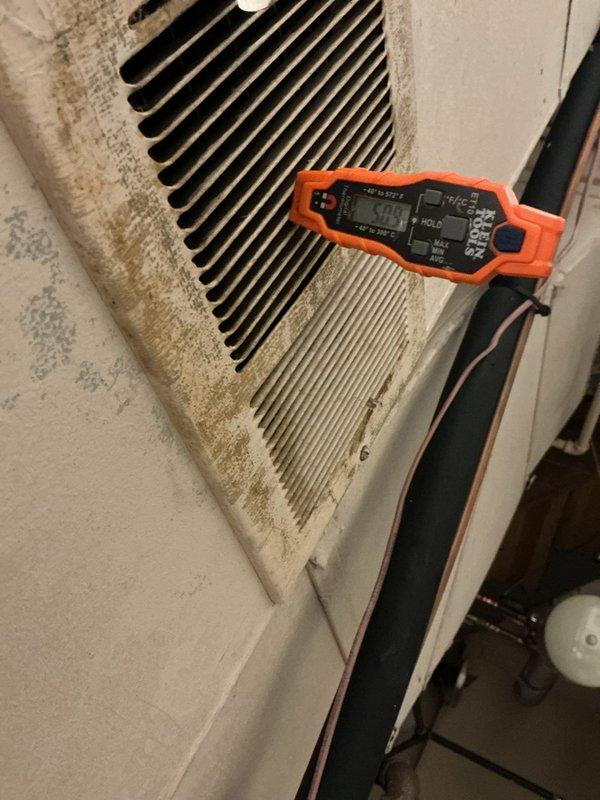 Completed scheduled cooling maintenance on two HVAC systems as part of ongoing preventative maintenance program. Performed comprehensive inspection and testing of wall-mounted air handler unit and Carrier furnace system with cooling capabilities. Conducted airflow measurements at supply grille using digital testing instruments, verified system operation, and documented equipment condition including visible dust accumulation on grille surfaces and surrounding areas. All systems operational and measurements recorded for maintenance records.