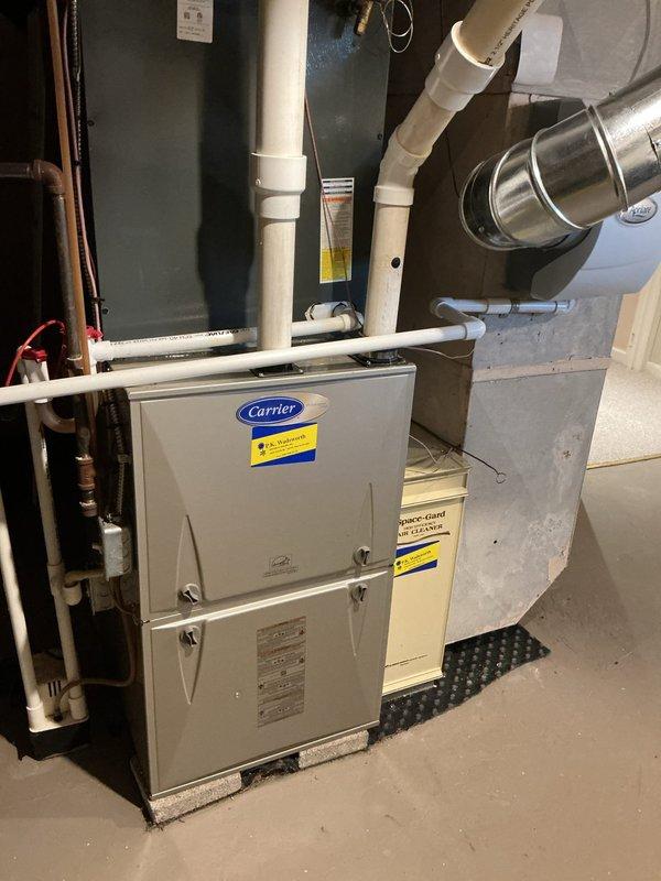 Completed scheduled cooling maintenance on two HVAC systems as part of ongoing preventative maintenance program. Performed comprehensive inspection and testing of wall-mounted air handler unit and Carrier furnace system with cooling capabilities. Conducted airflow measurements at supply grille using digital testing instruments, verified system operation, and documented equipment condition including visible dust accumulation on grille surfaces and surrounding areas. All systems operational and measurements recorded for maintenance records.