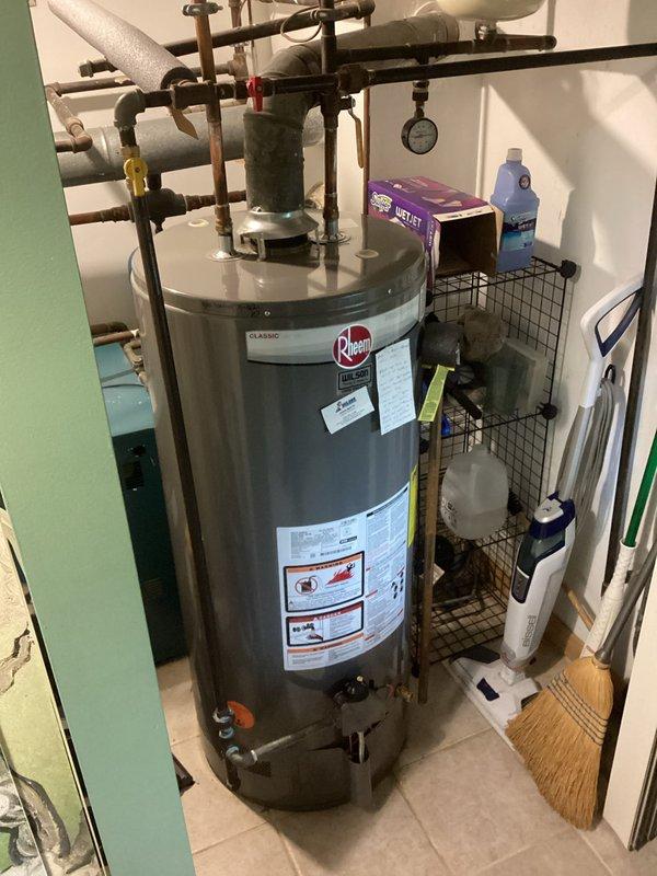 Performed routine maintenance flush on Rheem tanked water heater to remove sediment buildup and extend unit lifespan. Conducted comprehensive whole-home plumbing inspection, verifying proper operation of all shut-off valves, pressure relief valve, and water supply connections. All components found in good working order with no leaks or deficiencies identified.