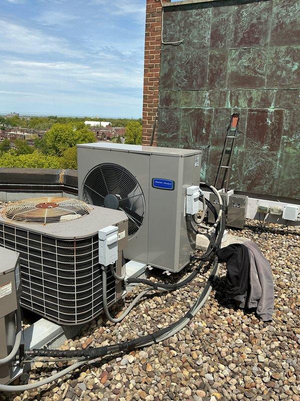 Completed preventive maintenance on two rooftop cooling units. Performed standard inspection procedures including checking refrigerant lines, electrical connections, and verifying proper operation of both the cylindrical condenser unit and rectangular heat pump system. Also inspected and serviced the Air Scrubber with ActivePure Technology unit located in the attic space, ensuring proper integration with the ductwork system.